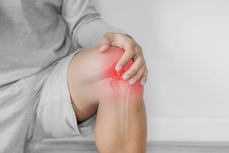 Physical therapy session at Kinesis Clinic featuring targeted muscle release and corrective exercise guidance.